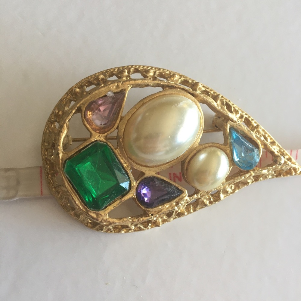 Gold tone Tear drop brooch with multi colored crystals